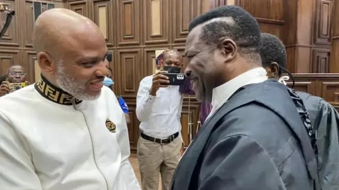 Nnamdi Kanu and new head of his defence team, SAN Mike Ezekome