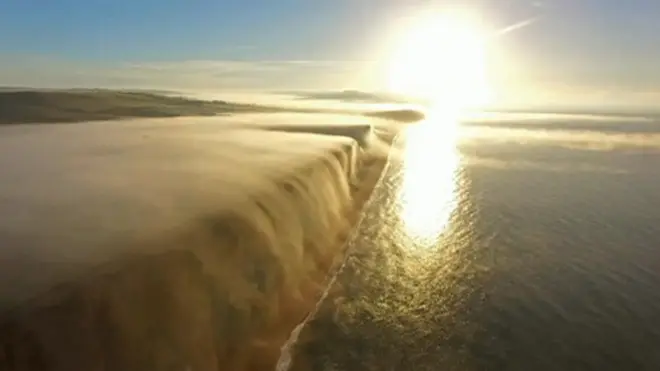 Mist over West Bay cliffs