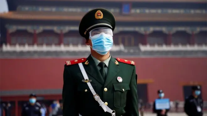 Policeman wearing face masks in Beijing