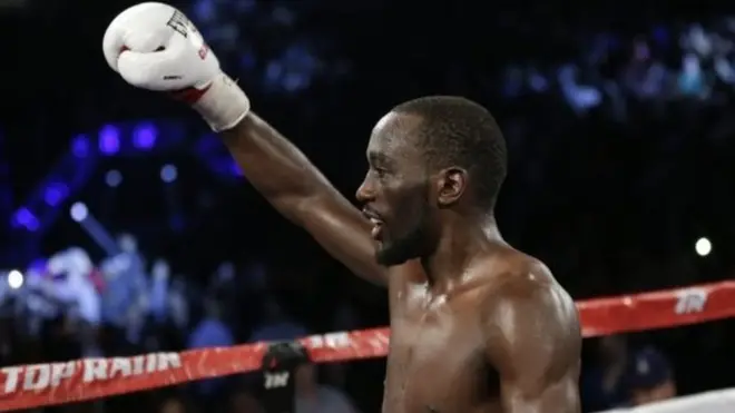 امریکی باکسر نے اپنی سزا سے صرف پانچ دن پہلے جان ملینا کو شکست دے کر ڈبلیو بی سی اور ڈبلیو بی او کے ٹائٹلز کا دفاع کیا تھا