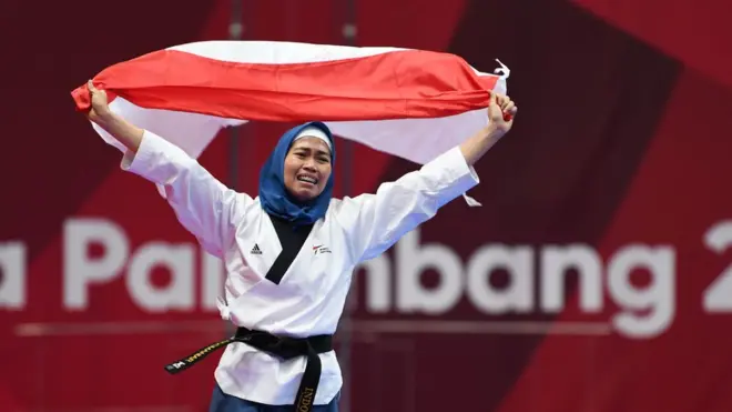 Defia Rosmaniar meraih satu-satunya medali emas Indonesia dari cabang taekwondo, olahraga yang akan dipertandingkan di Olimpiade 2020.
