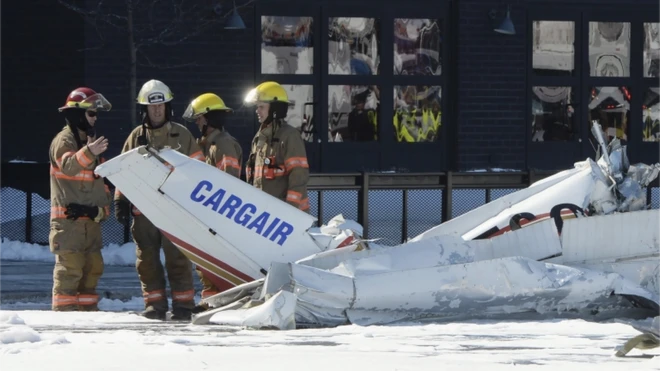 Emergency services on the scene of a small plane crash near Montreal.