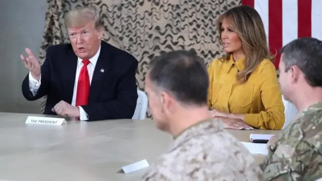 ترامب وميلانيا في قاعدة عين الأسد