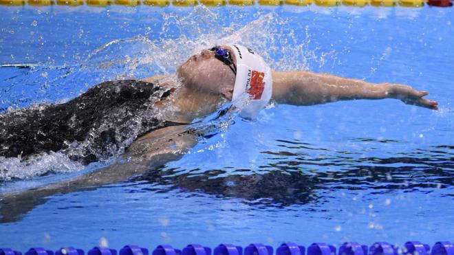 China"s Fu Yuanhui competes in the Women"s 100m Backstroke Final during the swimming event at the Rio 2016 Olympic Games at the Olympic Aquatics Stadium in Rio de Janeiro on August 8, 2016.