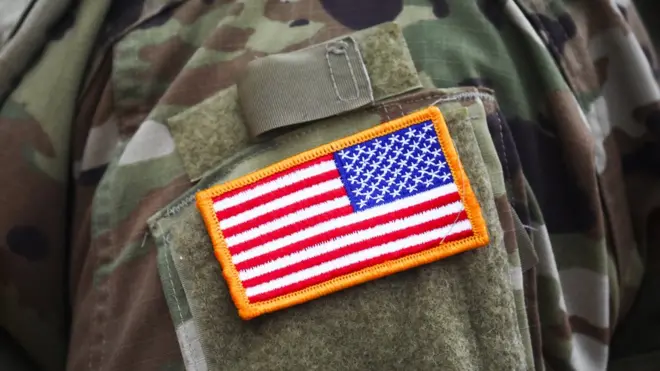 A US flag badge on a uniform of an American soldier in Poland. Photo: August 2020