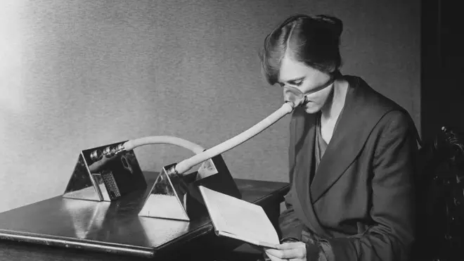 A woman wears a flu mask during the Spanish flu epidemic
