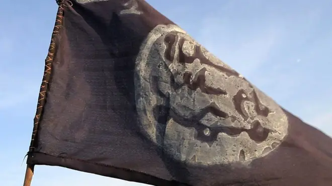 A Boko Haram flag in an area in Nigeria deserted by the militants after an offensive by Chadian soldiers - 2015