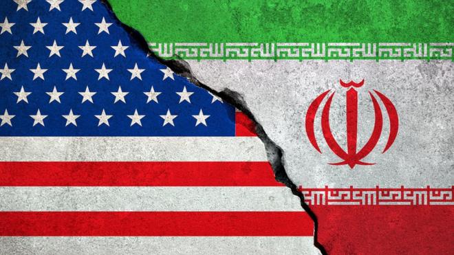 Graphic showing US and Iranian flags with crack down the middle