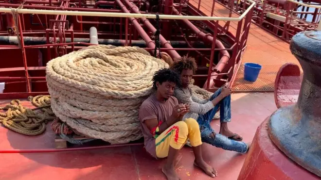 The migrants have been stranded on board the oil tanker for more than a month