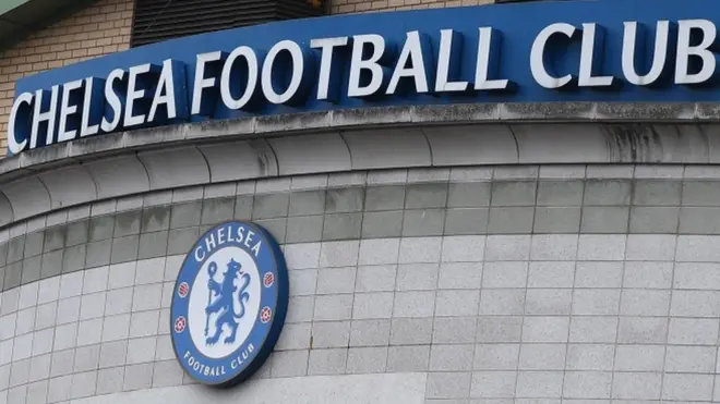 Chelsea sign outside Stamford Bridge