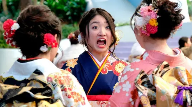 People take part in a Coming of Age Day celebration ceremony in Japan