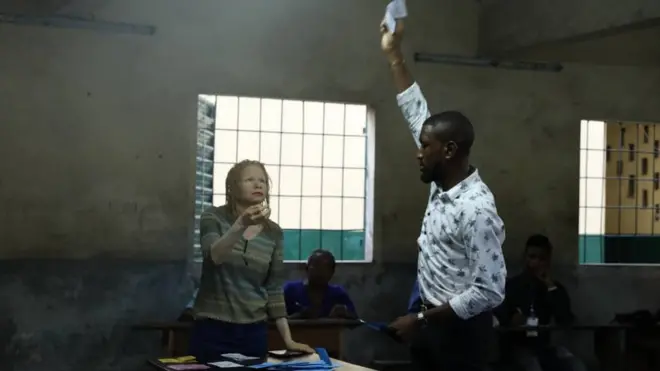 Elecam official dey count votes during di Cameroon 2020 elections