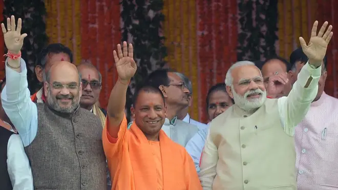 अमित शाह, योगी आदित्यनाथ और नरेंद्र मोदी