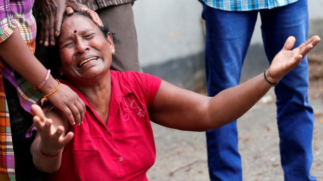 A relative of a victim of the explosion at St. Anthony"s Shrine, Kochchikade church, reacts at the police mortuary in Colombo