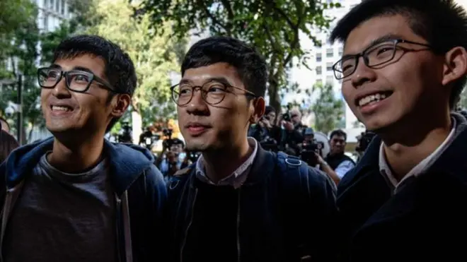 (จากซ้ายไปขวา) นายอเล็กซ์ เชา นายนาธาน ลอว์ และนายโจชัว หว่อง ได้รับการเสนอชื่อโดยสหรัฐฯ