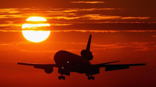 A commercial jet plane comes landing at Miami International Airport in 2004.