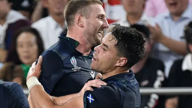 Scotland's Finn Russell and Sean Maitland celebrate