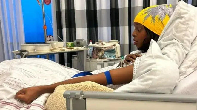 Shamsa Sharaawe lie down for hospital bed after di reconstruction surgery.