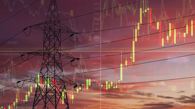 High voltage towers on the background of stock charts. Electricity price change concept