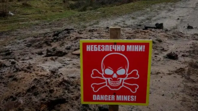 Табличка "Небезпечно міни!"