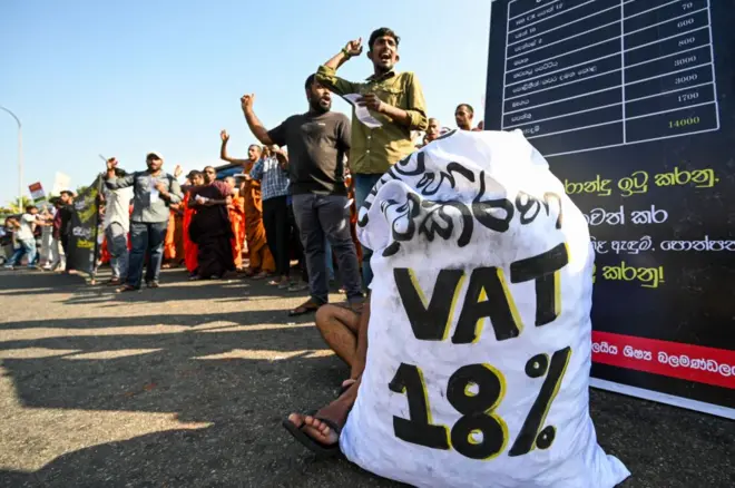 Sri Lanka university students take part in a demonstration demanding lower taxes and higher government spending on education in Colombo on January 8, 2025.