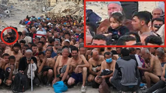 حشد من الرجال الغزيين بلا ملابس خارجية ينتظرون التفتيش الإسرائيلي