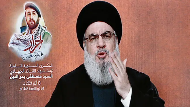 Лідер Хезболли Хасан Насралла виступає з промовою на екрані під час мітингу біля Бейрута, Ліван, 13 травня 2024 року