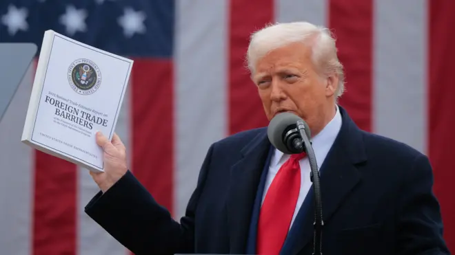 A treated image of US president Donald Trump holding up a document that reads 'Foreign Trade Barriers'