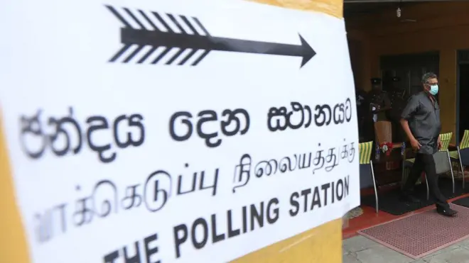 Sri Lanka's chairman of Election Commission Mahinda Deshapriya inspects a center used for a mock election ahead of the parliamentary election in Colombo, Sri Lanka, Saturday, June 20, 2020