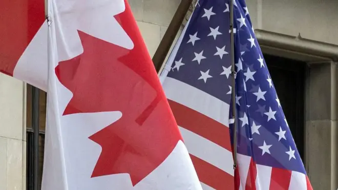 پرچم کانادا کنار پرچم امریکا