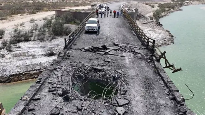 A hole in a damaged bridge in Iran's southern Hormozgan Province on July 17.