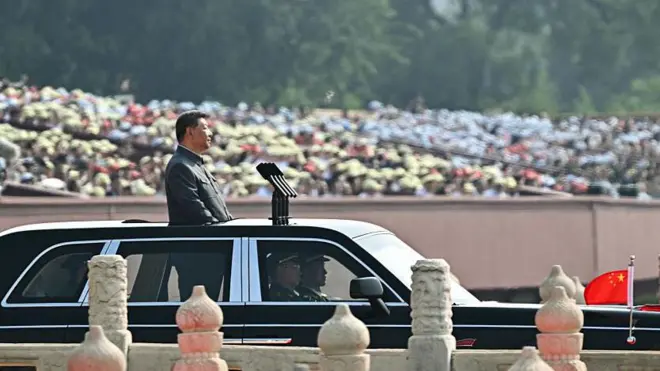 China's President Xi Jinping inspects the troops during a military parade marking the 80th anniversary of victory over Japan and the end of World War II, in Beijing's Tiananmen Square on September 3, 2025