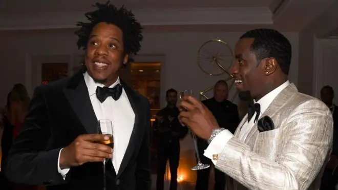 Rapper Amerika Serikat, Jay-Z, dan Sean "Diddy" Combs di sebuah pesta 