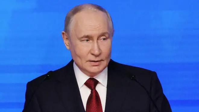 Путин