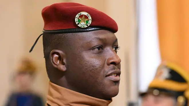 Ibrahim Traore wearing red beret looking straight