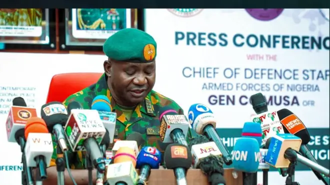 General Christopher Musa at a press briefing