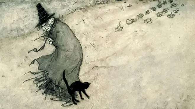 Ilustração de uma bruxa andando sobre a areia