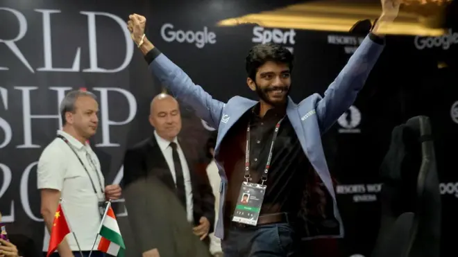 जीत के बाद जश्न मनाते गुकेश