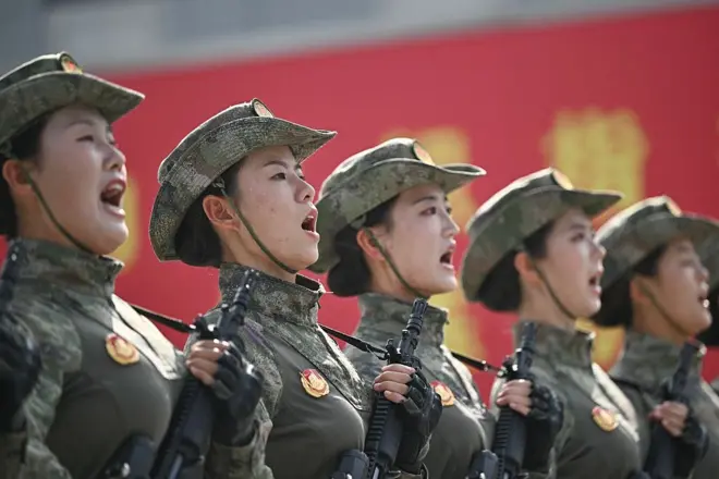 Chinese military personnel take part in a rehearsal ahead of the parade commemorating the 80th anniversary of the victory in the Chinese People's War of Resistance Against Japanese Aggression and the World Anti-Fascist War, which will be held on September 3, in Beijing on August 20, 2025. 