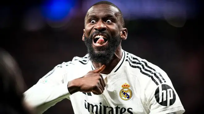 Antonio Rudiger of Real Madrid celebrates after beating Atletico Madrid on penalties in the Champions League. 