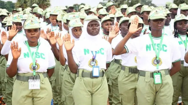 NYSC members raise dia hands