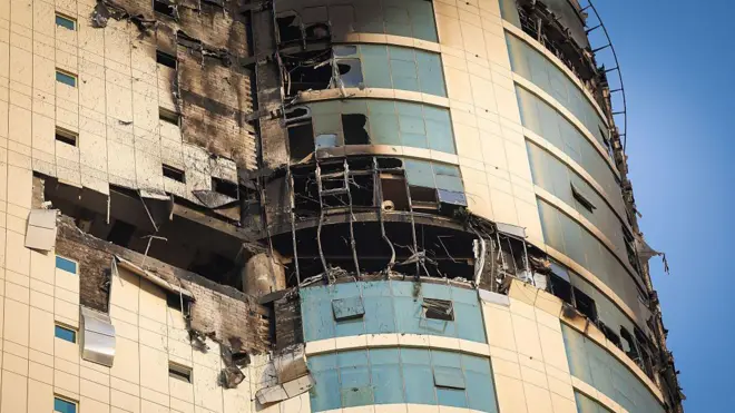 Здание, атакованное иранским дроном в Манаме, столице Бахрейна