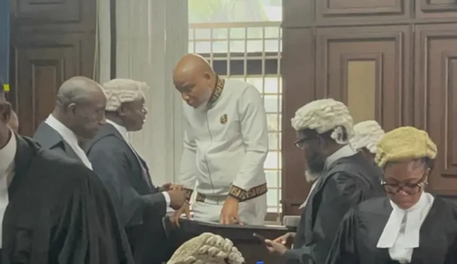 Nnamdi Kanu confering with his lawyers in court, 28 May, 2025