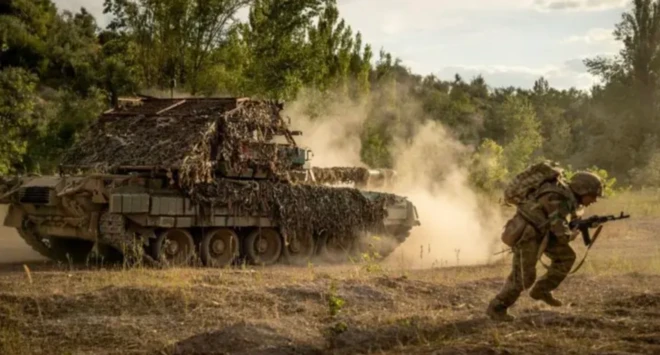 Soldier and tank in the frontline