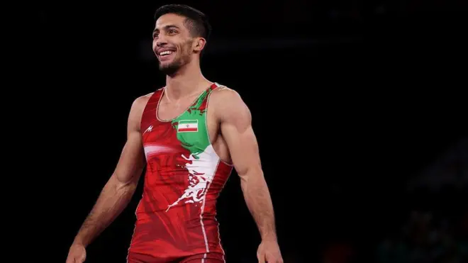 عکس آرشیوی - رضا گرایی که سال گذشته هم قهرمان المپیک شد و هم قهرمان جهان 