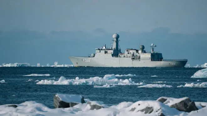 The Royal Danish Navy Thetis-class warship HDMS Vaedderen sails past sea ice off the coast of Nuuk, Greenland, on Wednesday, April 2, 2025