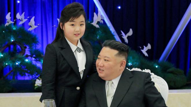 North Korean leader Kim Jong Un talks with his daughter Kim Ju Ae at a banquet to celebrate the 75th anniversary of the Korean People's Army in Pyongyang, 7 February 2023