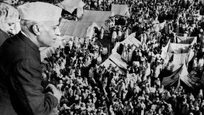 Picture taken on February 3, 1954 at Allahabad showing Indian Prime Minister Jawaharlal Nehru looking at the crowd gathered for attending the Shadus' procession which will cause hundreds of victims following a panic reaction among the spectators