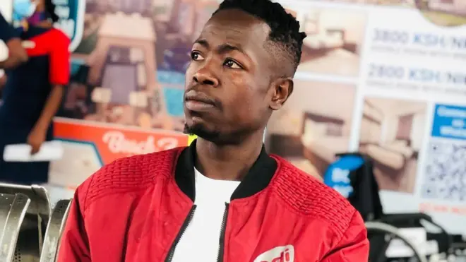 Ezekiel Otuoma sitting down