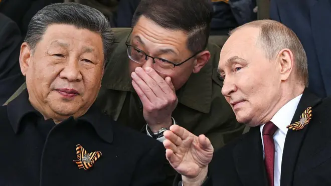 На параді Путін сидів пліч-о-пліч із Сі Цзіньпінем, який мав на своєму одязі георгіївську стрічку